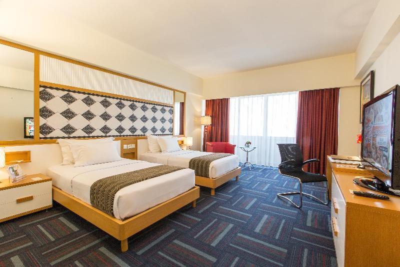 Merlynn Park Hotel Jakarta Room photo
